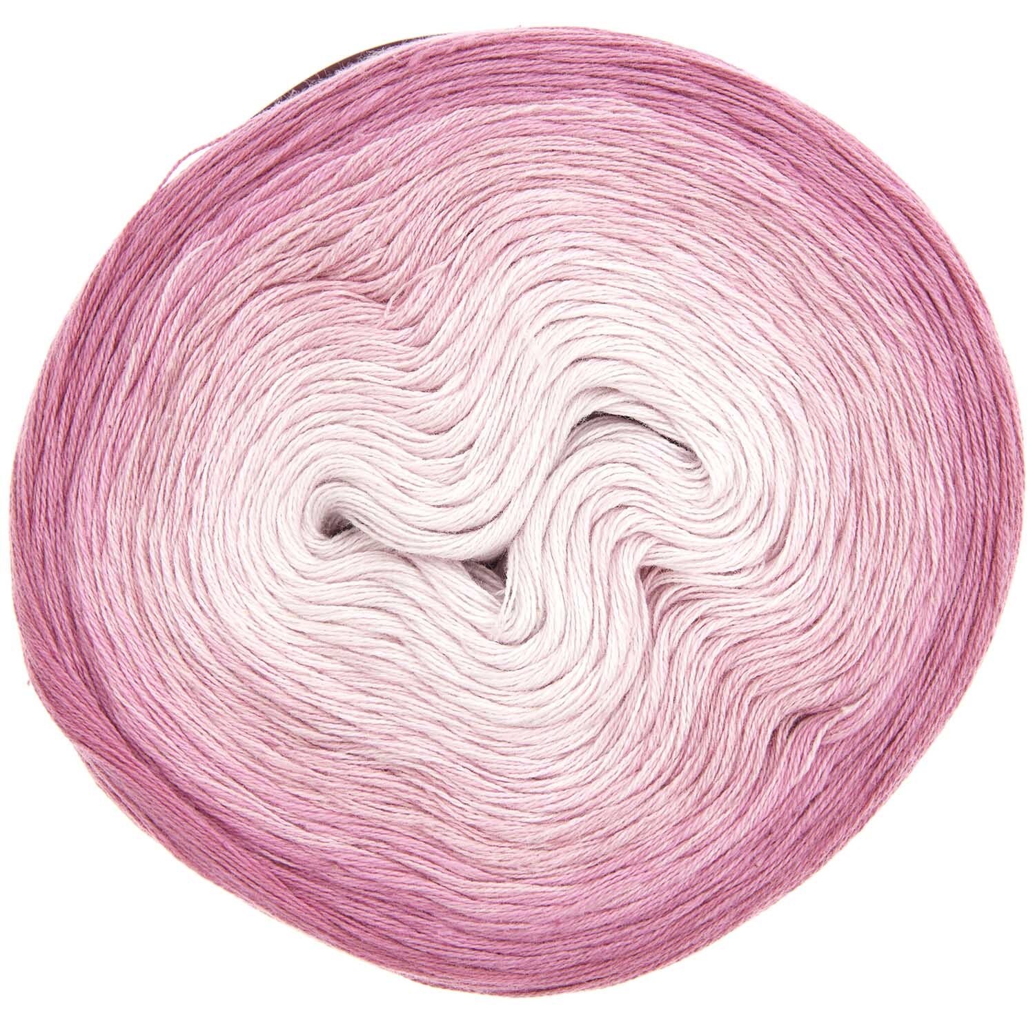 Strickset Shirt Modell 09: Garnrolle in Rosa- und Weißtönen, ideal für kreative Strickprojekte.