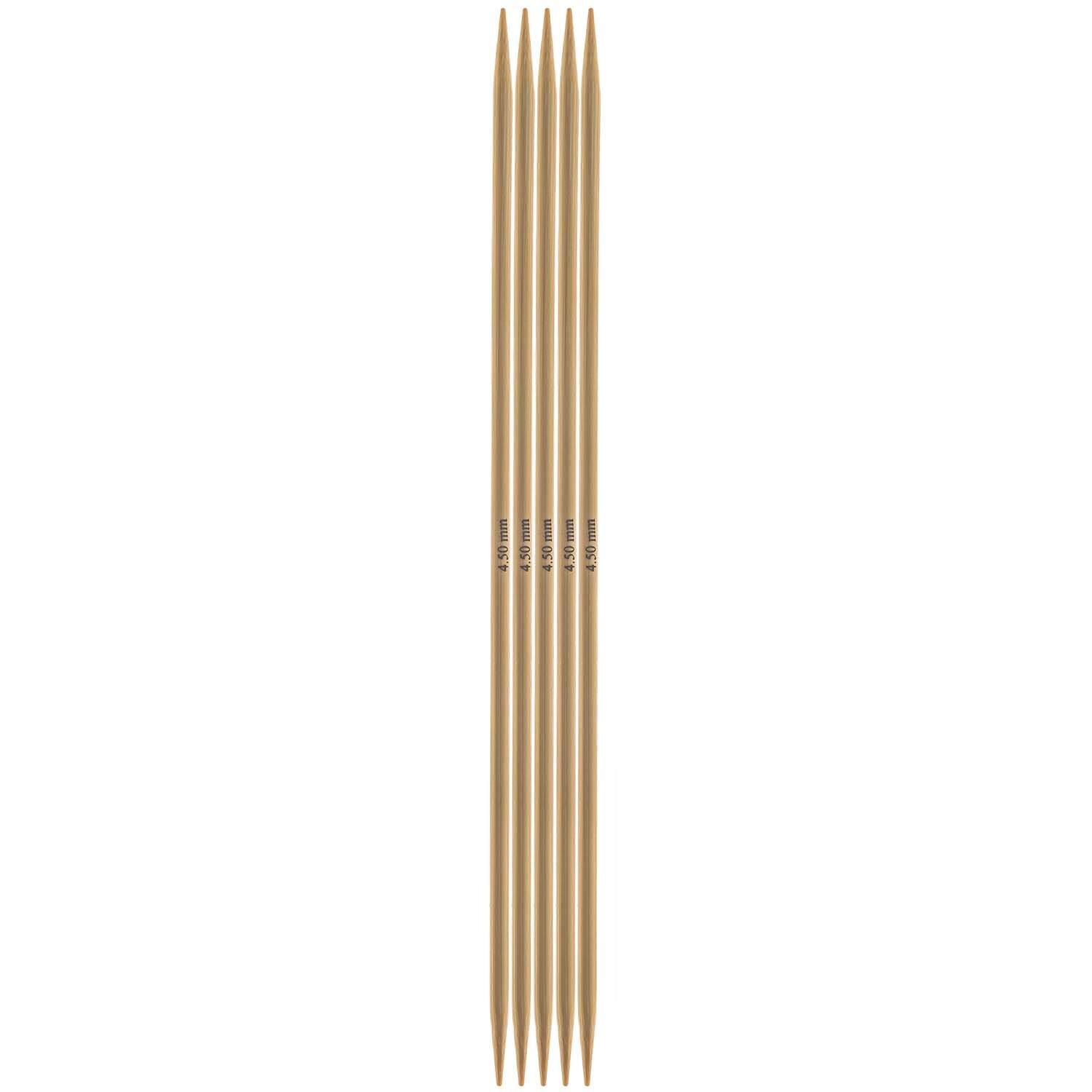 Nadelspiel 20cm Bambus von Rico Design, bestehend aus fünf glatten, hellbraunen Stricknadeln. Ideal für Strickprojekte.